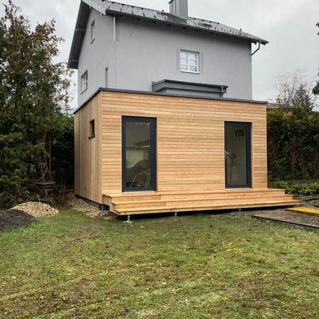 Ein 2-Module-Gartenhaus mit einer kleinen Terrasse für den österreichischen Partner McCube.